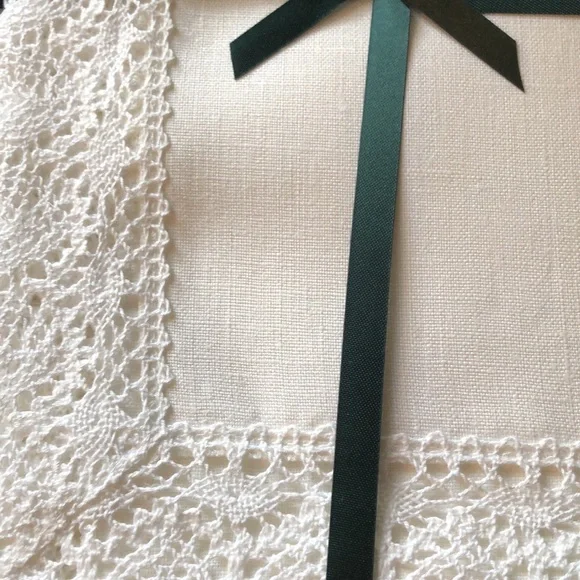 Vintage table runner linen with crocheted lace trim new in box.